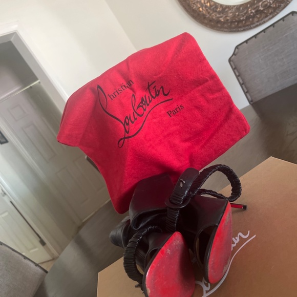 Christian Lousboustin red bottoms